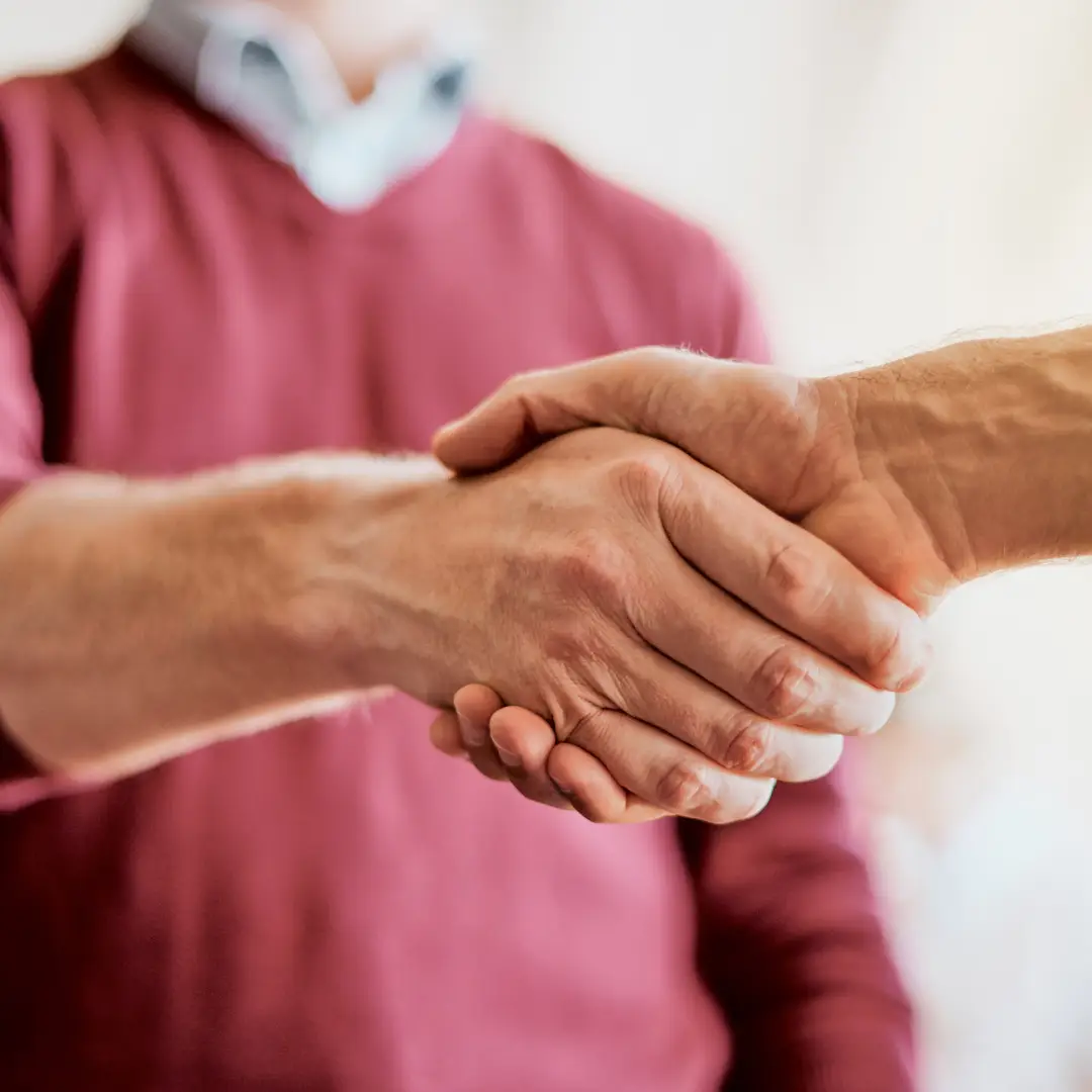 Pleasure doing business with you. Closeup of two unrecognizable peoples hands greeting and shaking hands inside of a office at work.