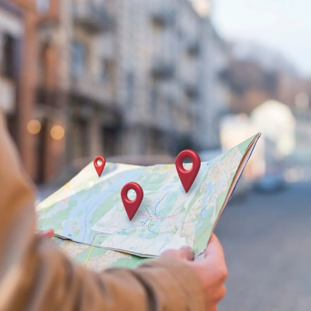 Side view hands holding map